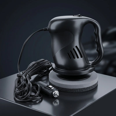 Black electric car waxing machine with a cord and car cigarette lighter power adapter, displayed on a dark reflective surface.