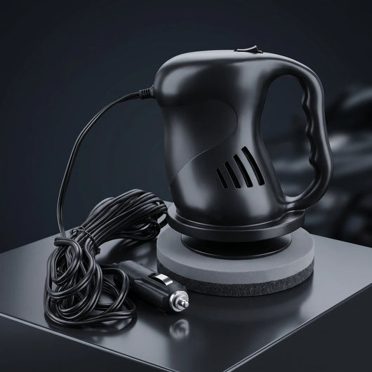 Black electric car waxing machine with a cord and car cigarette lighter power adapter, displayed on a dark reflective surface.
